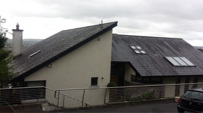 Before cleaning of the roof of a modern Cork home by Pro Wash, Ireland