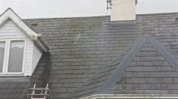 House in Cork before roof cleaning  showing the state of the slates.   Pro Wash, Ireland