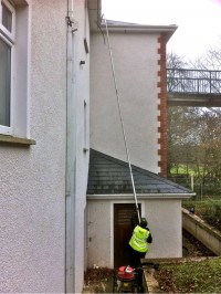 Gutter cleaning using advanced long pole technology with soft washing gentle cleaning action -   by  Pro Wash.ie, Cork, Ireland