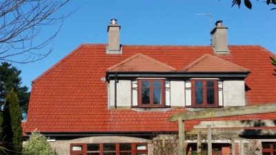 Before and after cleaning of the roof of a Cork house by Pro Wash, Ireland